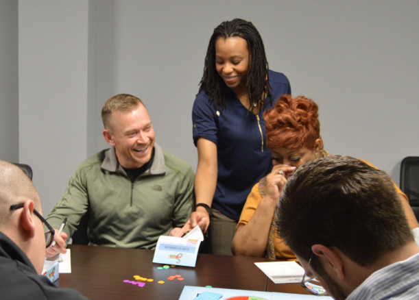 Employees enjoying game night.